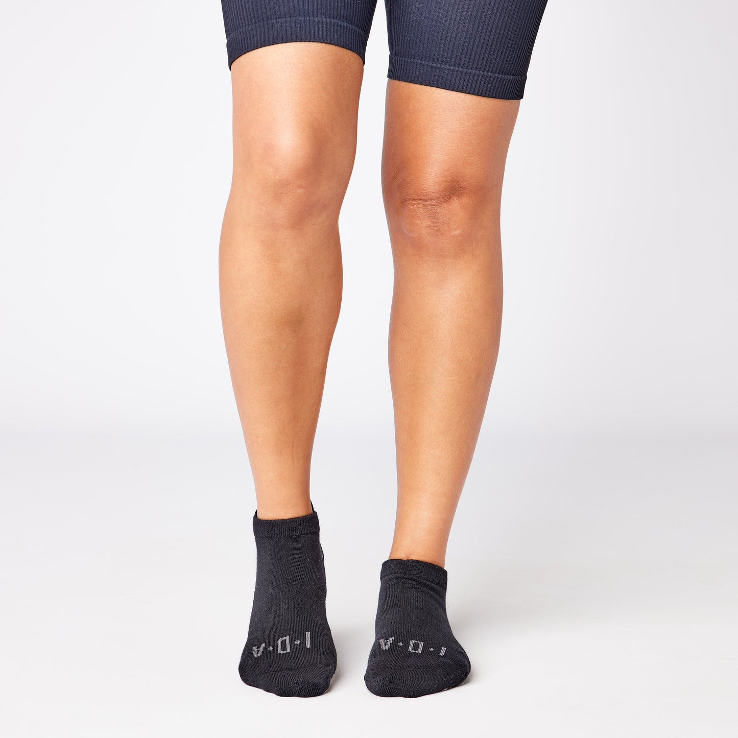 Black ankle grip sock for yoga