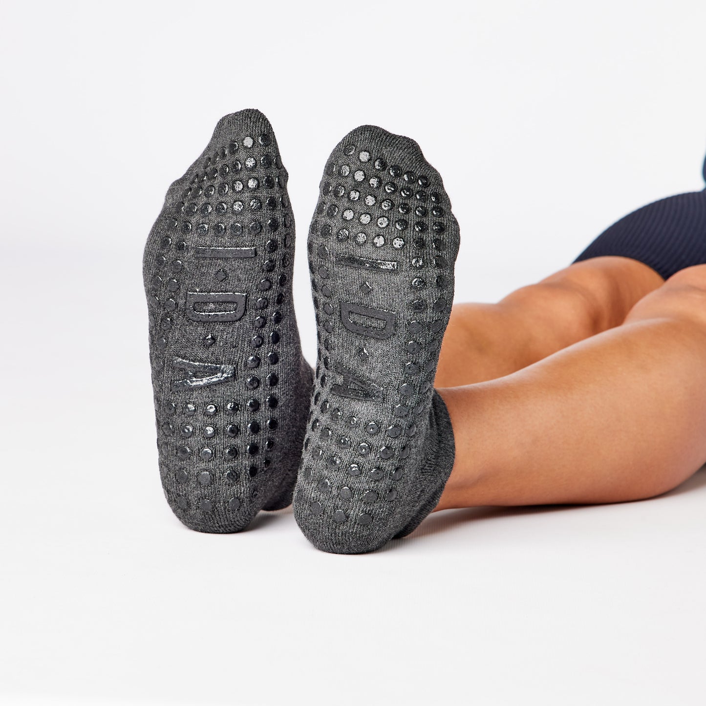 Charcoal grip sock with black non-slip sole