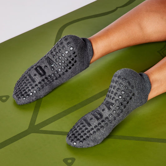 Grip socks enhancing stability in Pilates practice