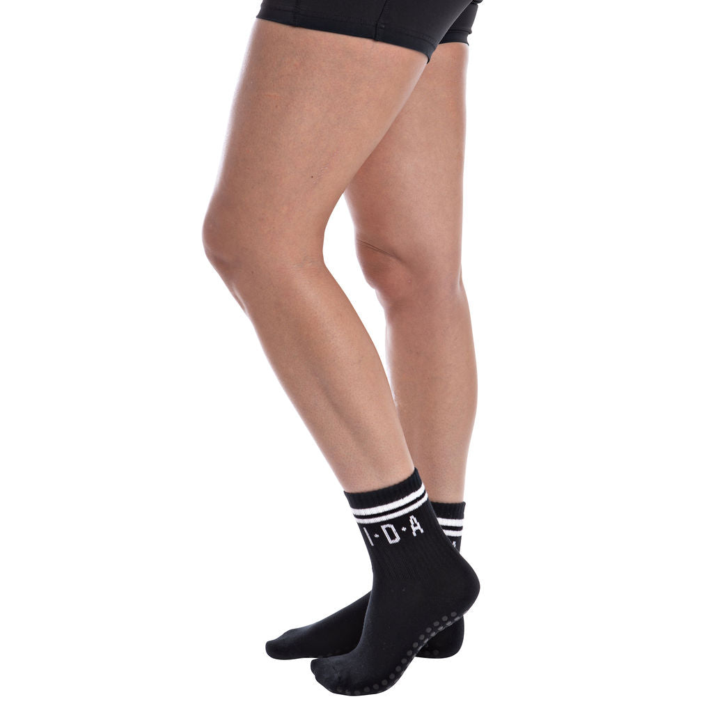 Black grip socks with white stripes