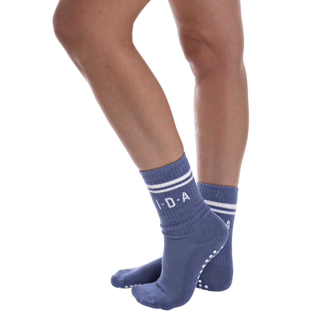 Blue long grip sock with white non-slip sole
