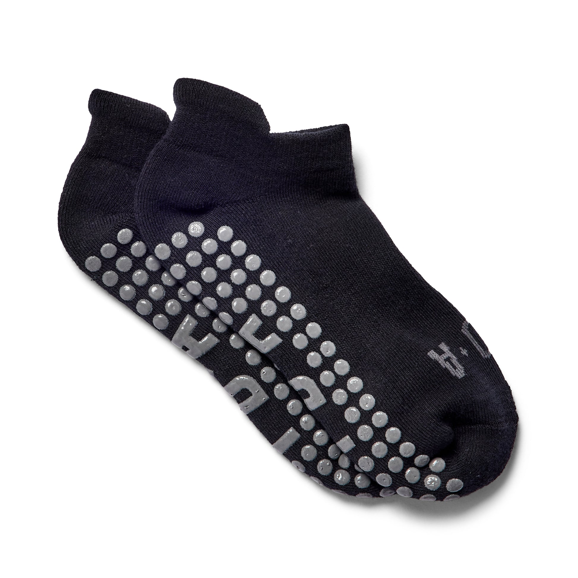 Black ankle grip sock for yoga