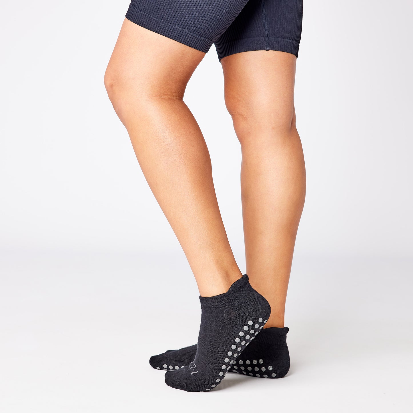 Black ankle grip sock for yoga