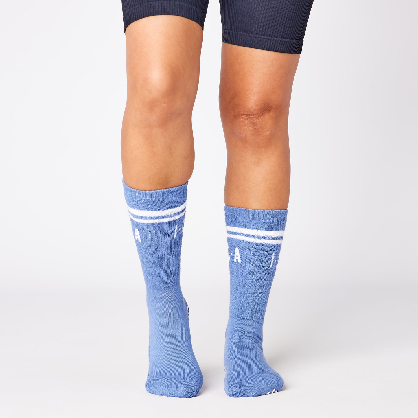 Blue knee-high socks with white grip sole and stripes 