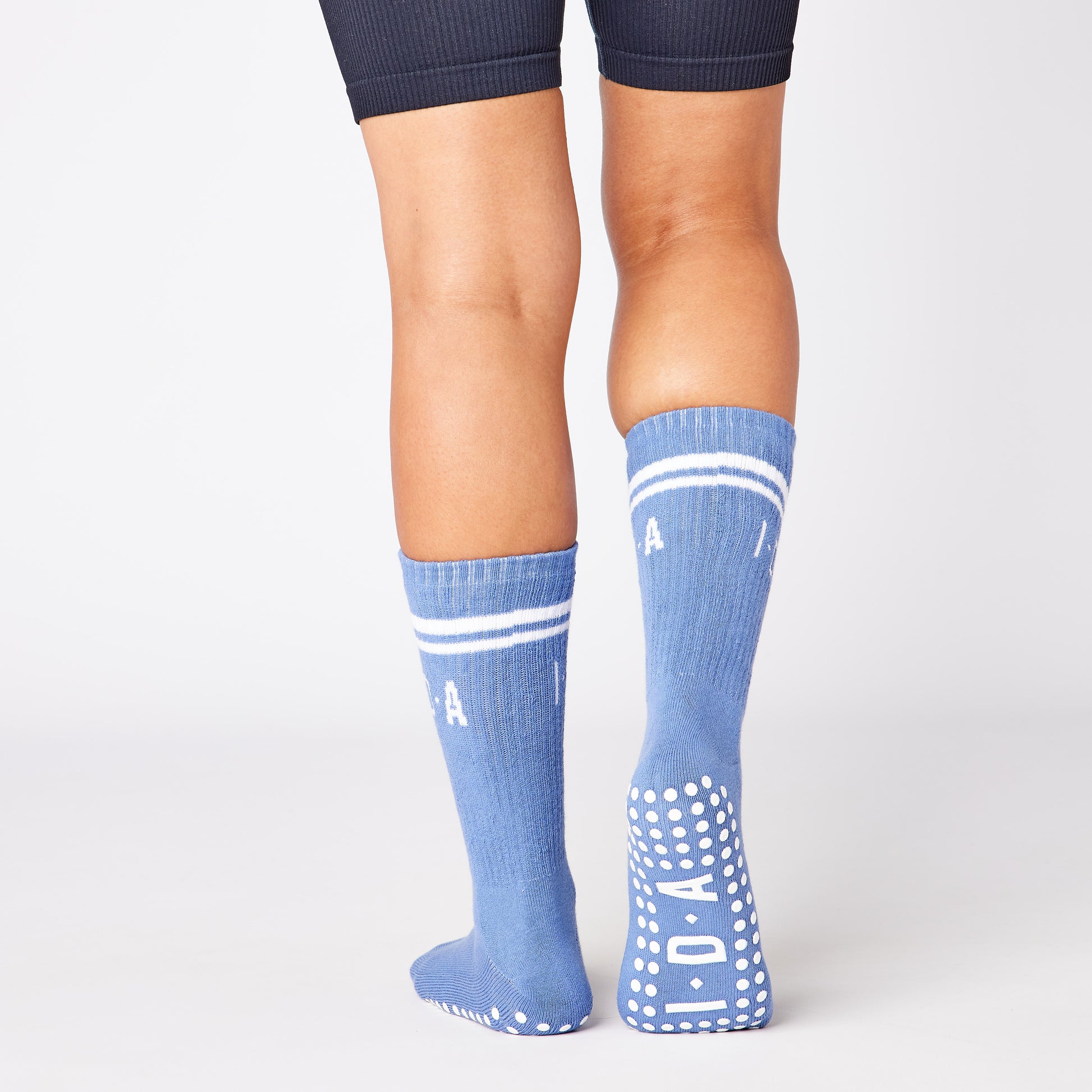 Blue long grip sock with white non-slip sole