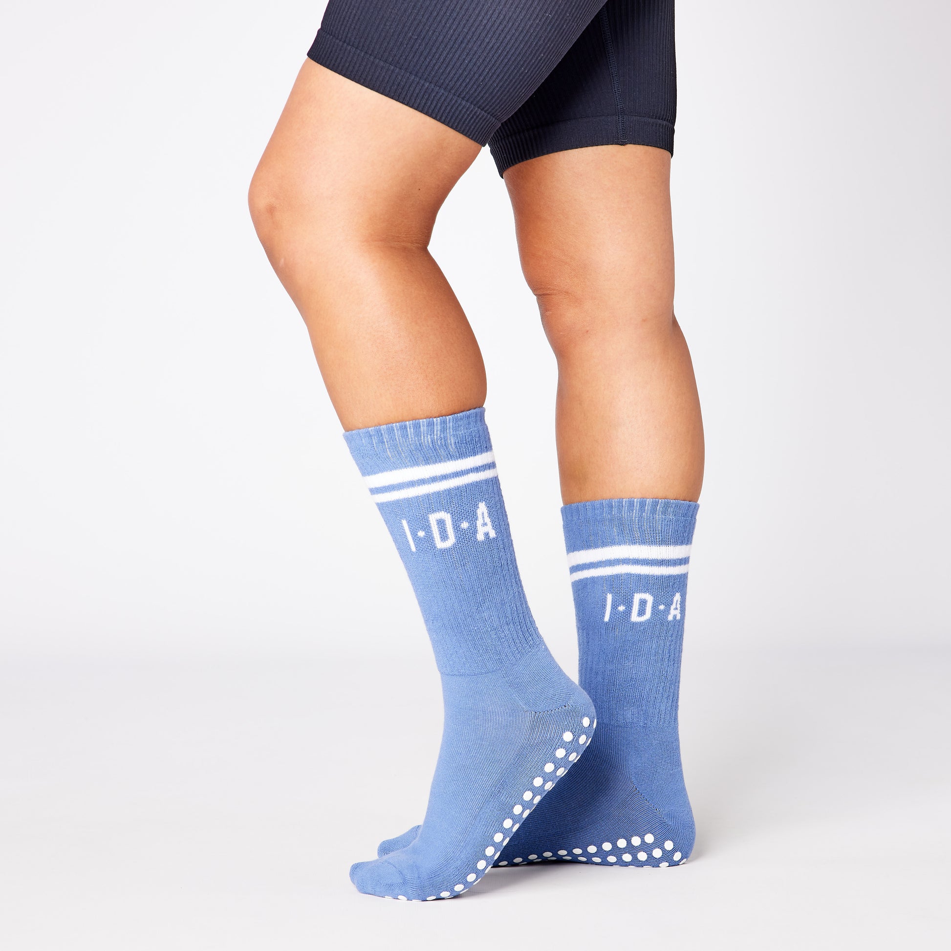 Blue long grip sock with white non-slip sole