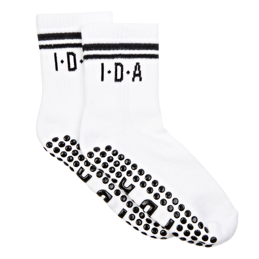 White socks with black grip sole