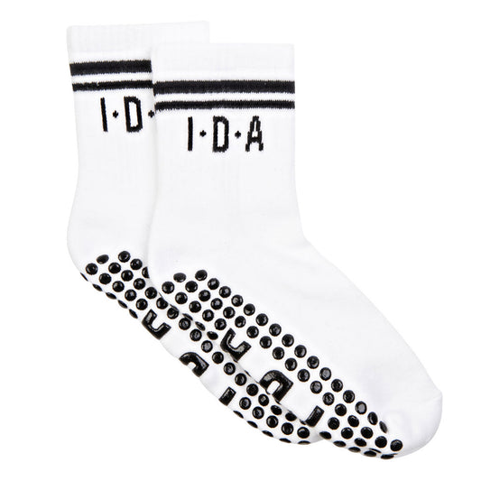 White socks with black grip sole